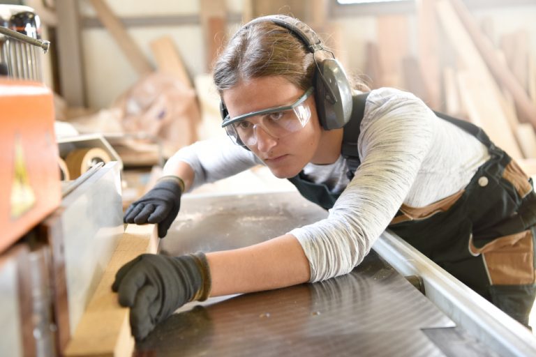 Young woman in crafstmanship school, training course