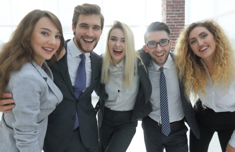 happy business team looking at camera. the concept of teamwork