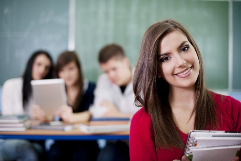 Happy student in the classroom
